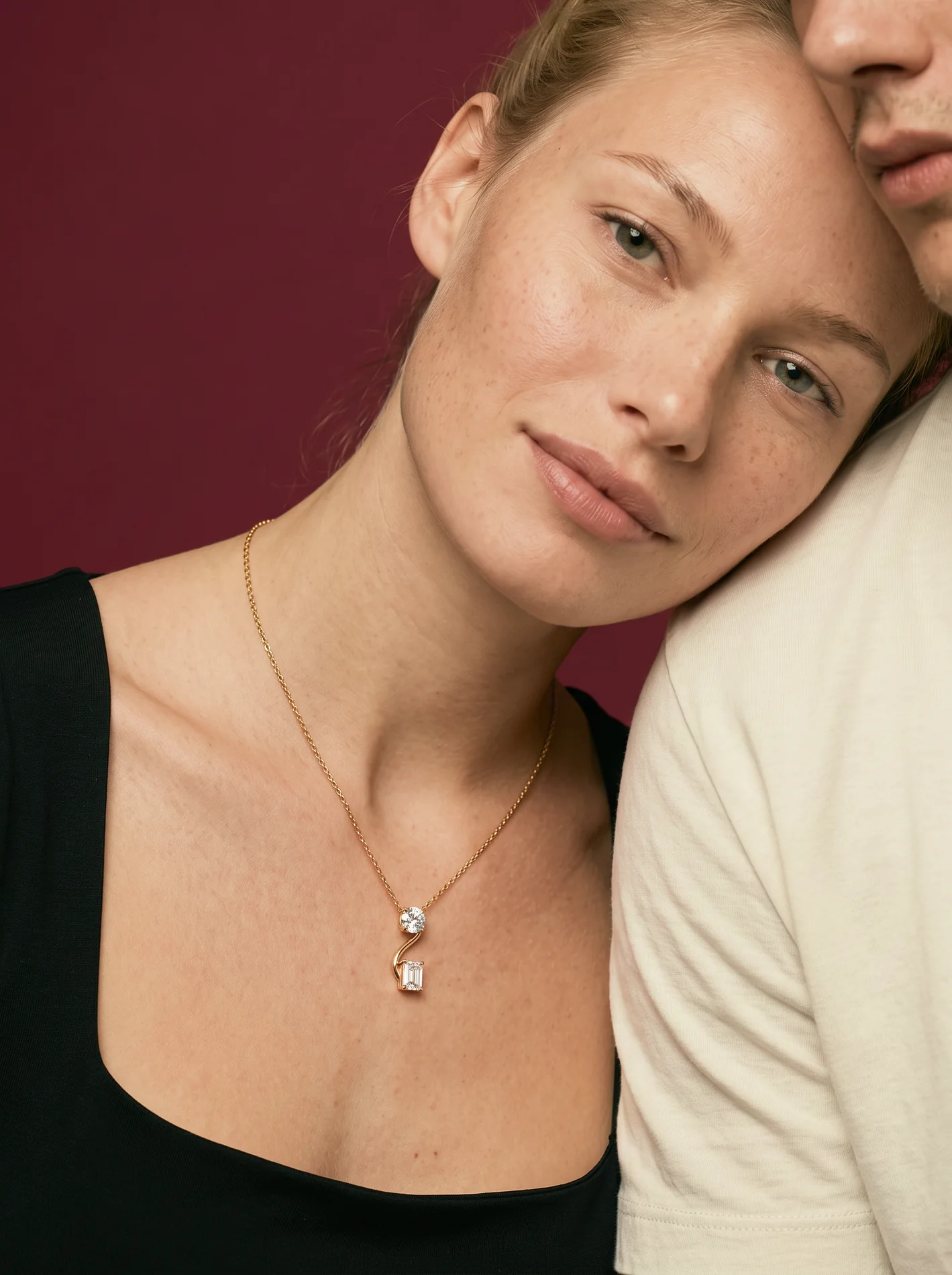 The love pendant worn close to the neckline.